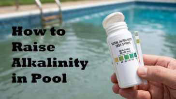 Checking pool water levels with a test strip to determine how to raise alkalinity in pool